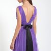 Vestido de Moncho Heredia corto de corte imperio en tul de color morado de la nueva temporada 2023 espalda 1019.7